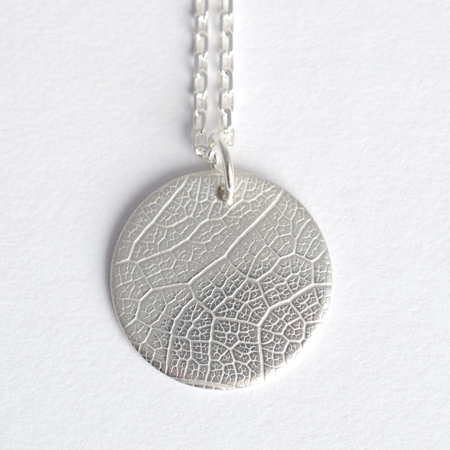 Textured medallion necklace